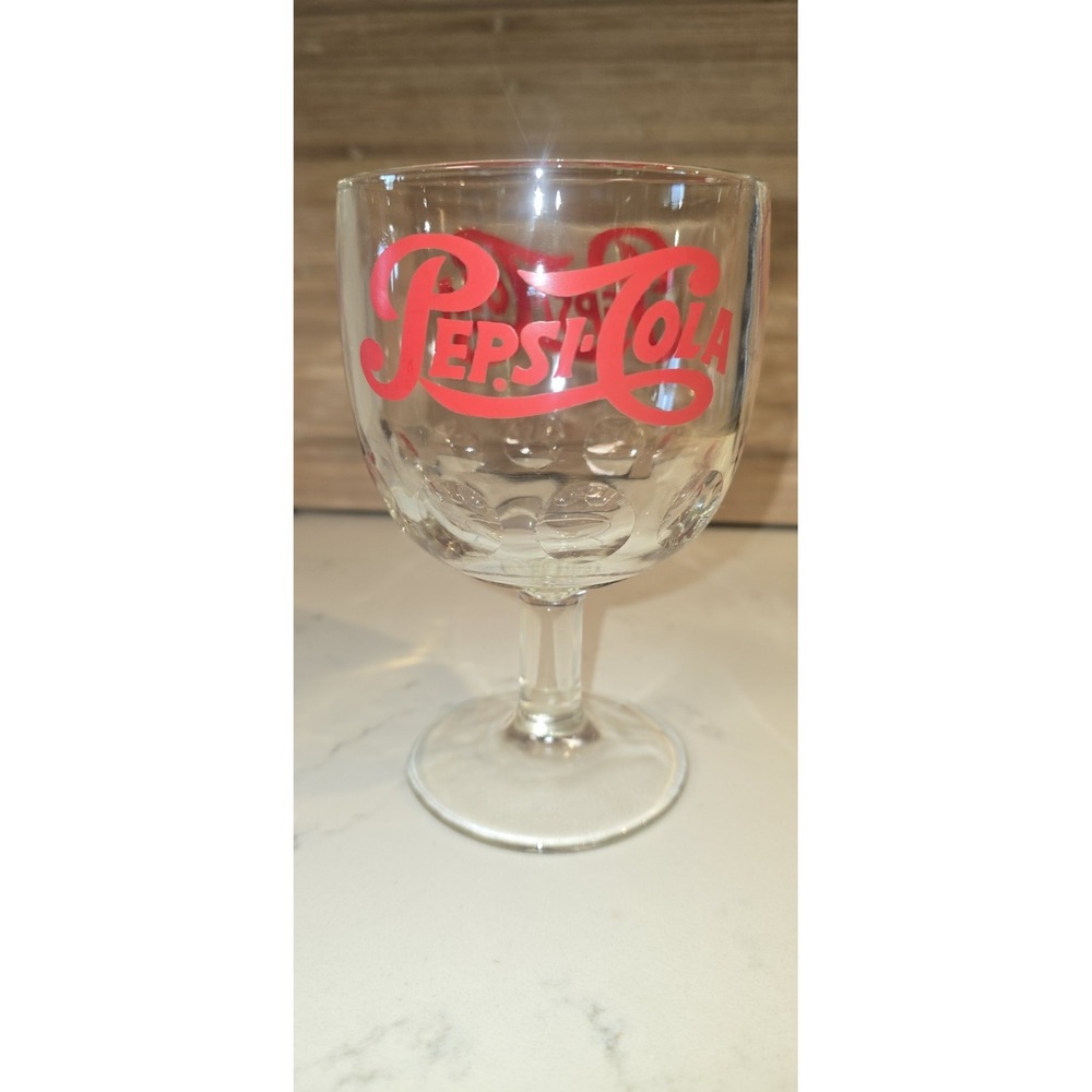 Vintage Pepsi-Cola goblet features a distinctive "thumbprint" or dimpled texture